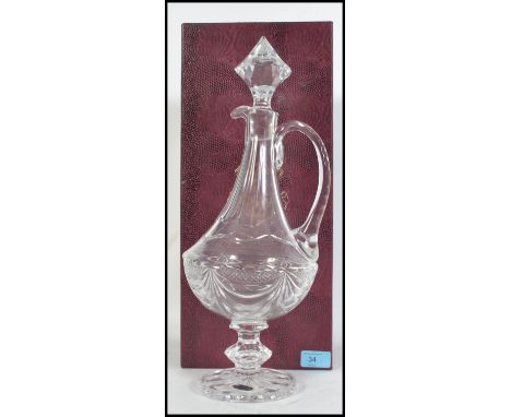 A 20th century boxed Cut glass crystal Taille - Maine Decanter / Claret Jug with stopper in original presentation box. Measur
