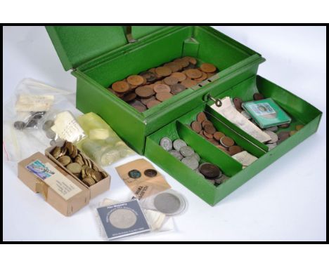 A collection of vintage coins dating from the 19th century to include British coins along with coins from around the world. A
