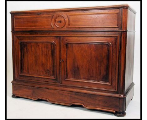 A 19th century French marble and mahogany linen press commode chest cabinet, The press raised on pad feet with twin geometric