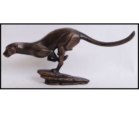 A vintage style, 20th century cast iron figure of a Cheetah. Measures 28cms wide.&nbsp;
