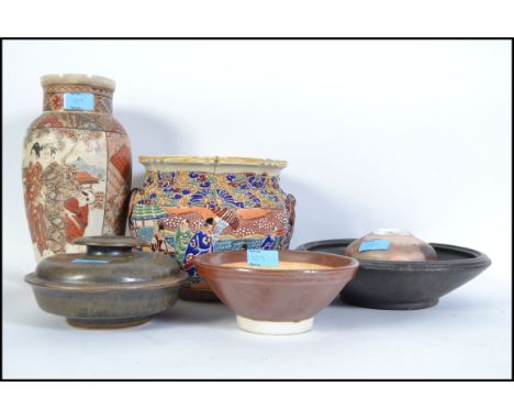 A collection of studio pottery dating from the 1970's to include a Barry Hayes Australian pot and others along with Japanese 