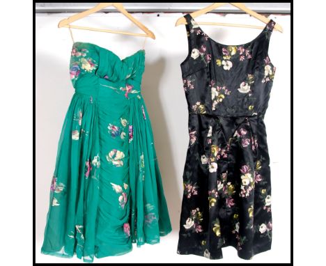A collection of vintage clothing to include ladies dresses, a stunning 1960's dressing gown and a retro gents leather jacket.