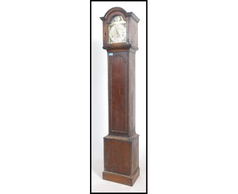 A 20th century oak cased granddaughter clock by Kemp Brothers of Bristol having silvered chapter ring with Roman numerals and