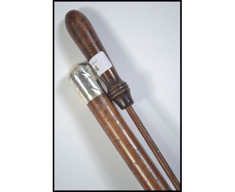 A silver topped swagger stick with notation OBP 41st Regt together with a 19th century rifle cleaning rod.