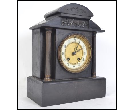 Am Edwardian Slate and Marble mantle clock having gilded columns &nbsp;with 8 day movement, gilt enamel dial with Arabic&nbsp