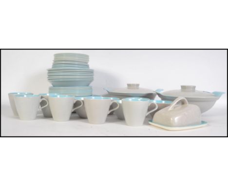 A large quantity of Poole Ice cream and Seagull tableware consisting of cups, saucers, plates, bowls, serving dishes etc plea