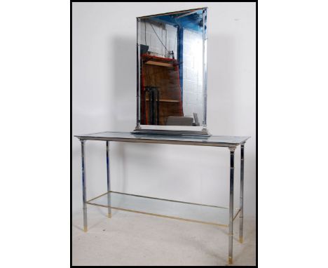 An art deco style chrome and gold finished glass topped consul table with glass shelf under. &nbsp;Complete with matching gla