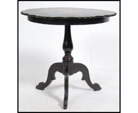 A Victorian 19th century papier mache tripod wine table in the manner of&nbsp;Jennens and Bettridge of Birmingham having spla
