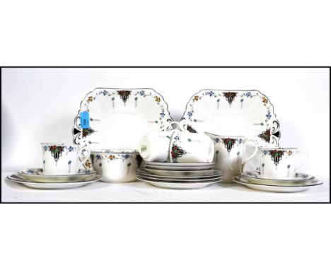 A 1930's Art Deco Shelley 5 piece ceramic tea service in a stunning pattern comprising cups, saucers, plates etc ( see illust