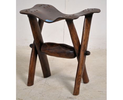 An unusual Victorian Arts &amp; Crafts organic stool having a beautiful tooled leather top with copper studding over the trip