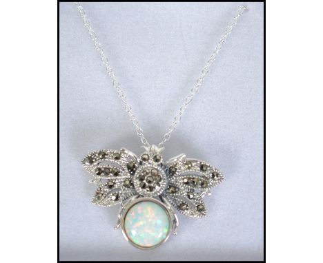 A ladies Art Deco style silver, marcasite and opal adorned pendant necklace on silver chain complete in the presentation case