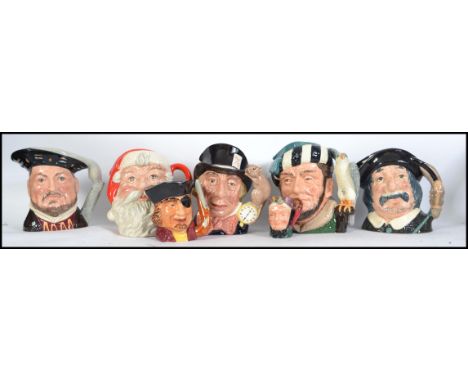 A collection of Royal Doulton ceramic Toby Jugs to include The Falconer D 6533, Mad Hatter D6598, Sancho Pancho D 6456, Henry