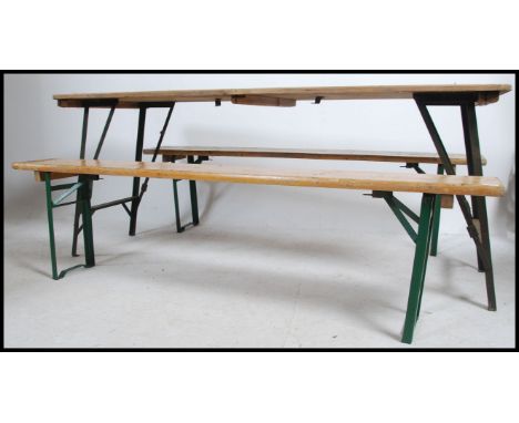 A stunning &nbsp;vintage ex military refectory mid 20th century &nbsp;trestle table and matching folding benches. The benches