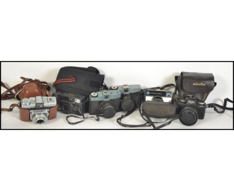 A collection of vintage cased &nbsp;cameras to include 35mm examples such as Kodak, Minolta etc