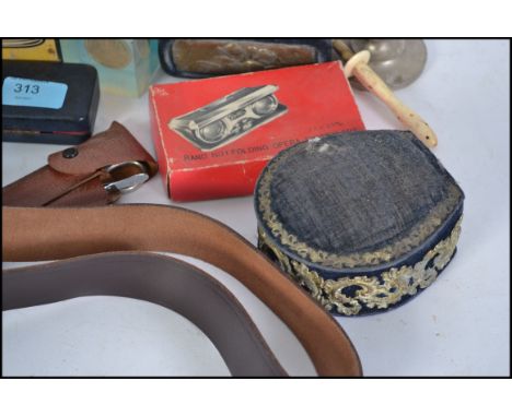 A collection of vintage items to include knives in original sheaf's, razors, opera glasses, trinket boxes, scout belt etc ple