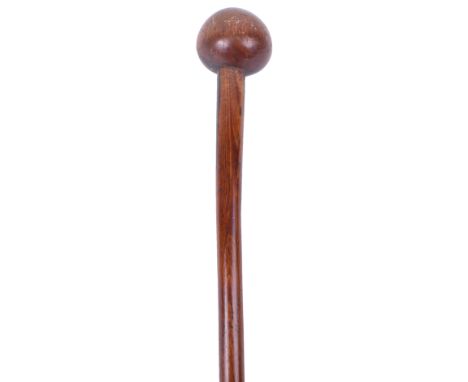 South African Knobkerrie, having a small two tone bulbous wood head and shaft with hide covering to lower section. Some stres