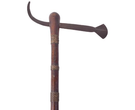 Zulu / African Tribal Battle Axe, having a steel tang with fan shaped head and upward curved spike, wooden haft with seven se