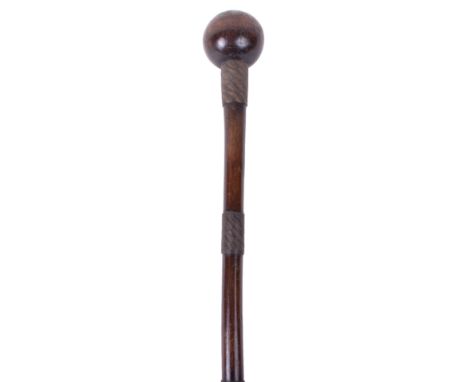Zulu Knobkerrie, being an early example with small type bulbous head and five sections of two tone copper wire binding to the