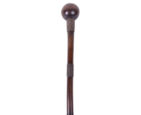 Zulu Knobkerrie, being an early example with small type bulbous head and five sections of two tone copper wire binding to the