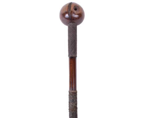 Zulu Warriors Knobkerrie, good early example with bulbous head having large crack and circular hole to the centre. The shaft 