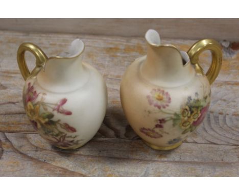 A ROYAL WORCESTER SMALL BLUSH IVORY JUG&nbsp;TOGETHER WITH ANOTHER - THE SECOND HAVING DAMAGES