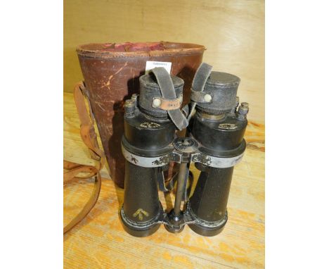 A PAIR OF CASED MILITARY BINOCULARS, SERIAL NO 63777 WITH BROAD ARROW MARK