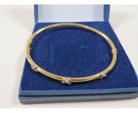 A 9CT GOLD BANGLE MARKED 375, APPROX WEIGHT 4.4g