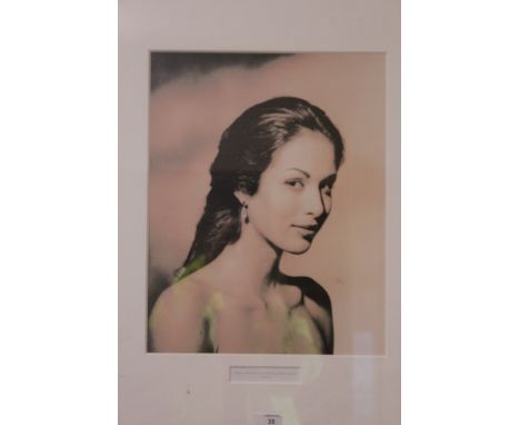 A MODERN FRAMED PORTRAIT OF A LADY