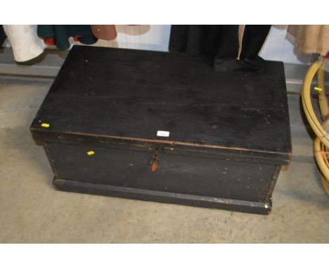 A wooden steamer trunk