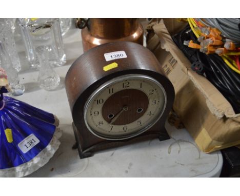 An oak cased Smiths two hole mantle clock
