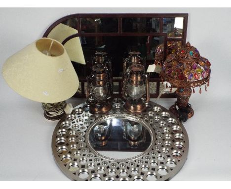 A collection of lamps including a Moroccan style table lamp and two wall mirrors. [3]