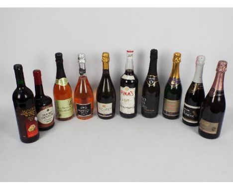 Ten bottles of drink to include Pimms, sherry, prosecco and similar.