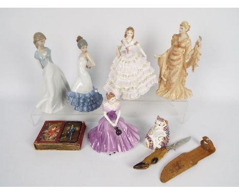 A collection of figurines comprising two Nao, one Wedgwood, one Royal Worcester and one Coalport, largest approximately 24 cm