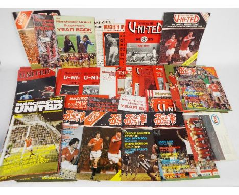 Manchester United Football Items. A large box full of items such as 1980s match tickets, Year Books, Newsletters, information