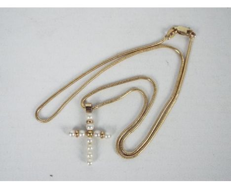 A 9ct gold and pearl crucifix pendant on 9ct gold necklace, 44 cm (l), approximately 4.6 grams all in.