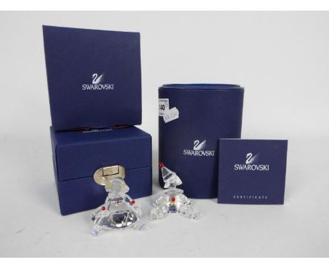 Swarovski - Two boxed puppet / clown models. [2]