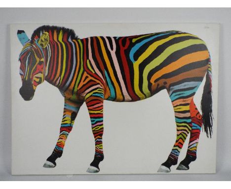 A print on canvas depicting a multicoloured zebra, approximately 66 cm x 91 cm.
