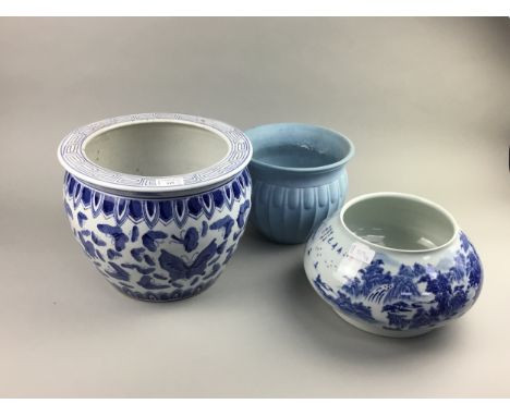 BLUE AND WHITE CIRCULAR PLANTER, with butterfly decoration, 30cm diameter, along with two other planters (3)