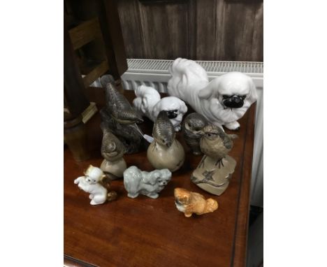 COLLECTION OF POOLE AND OTHER CERAMIC BIRDS, along with five ceramic dogs (10)