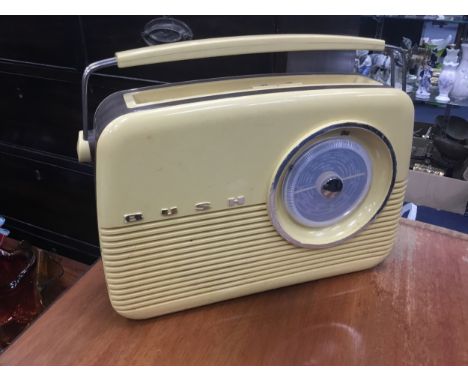 VINTAGE BUSH TRANSISTOR RADIO, along with a portable record player (2)