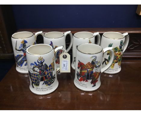 SIX SADLER CERAMIC TANKARDS, along with four decorative wall hanging shields (10)