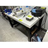 (1) Work table 2/ Westward 4 1/2" Vise 4' X 30 " Subject to Bulk Bid Lot 249 The greater of the