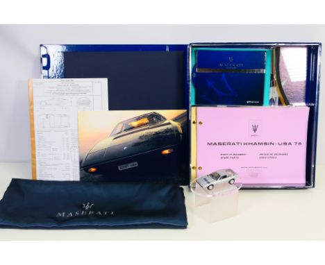 Maserati - Grani & Partners - A boxed Maserati Khamsin set from Maserati Classiche with a 1/43 scale model, ad copies of the 