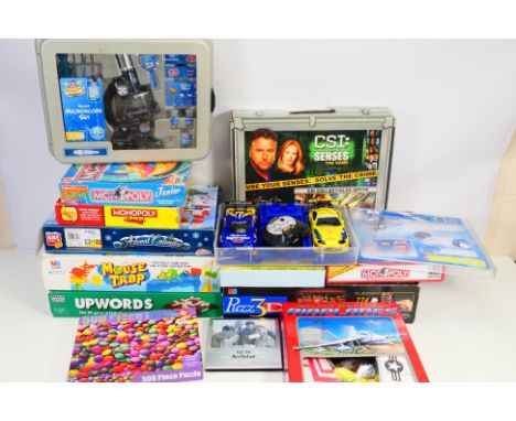 MB Games - Parker - Chad Valley etc - a quantity of boxed board games and jigsaws and a boxed Chad Valley microscope etc. The