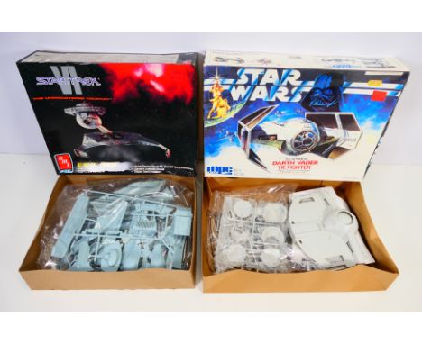AMT/Ertl - MPC/Ertl - Two Sci-Fi rel;ated plastic model kits, comprising of AMT/Ertl #8229 Star Trek VI 'Klingon Cruiser'; to