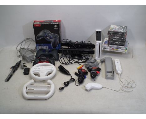 Nintendo - Playstation - A mixed collection of unboxed consoles and various video games for two different consoles, to includ