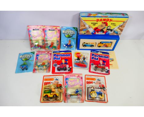 Corgi - Matchbox - Majorette - Ertl - a collection of boxed or carded character diecast vehicles to include Muppets, Popeye D