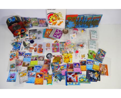 Pokemon - Others - A Pokemon tin containing a quantity of mainly Pokemon and other Japanese anime collectables . Lot includes