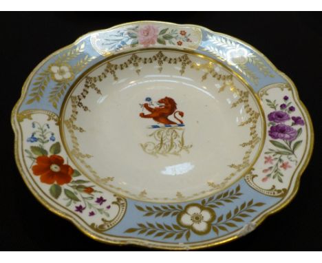 Chamberlain Worcester porcelain dish with family crest of lion and blue rose, A/F