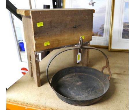 Cast iron skillet and wooden stool